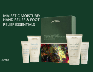 Aveda Majestic Moisture Hand Relief and Foot Relief Essentials gift set with four skincare tubes and a decorative box on a dark green background.