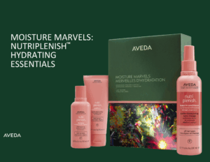 Aveda Nutriplenish Moisture Marvels Hydrating Essentials set shown with three pink hair care bottles and product box on a dark green background.